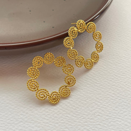Aretes Boston